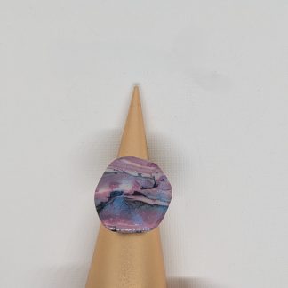 Pink and black marbled ring